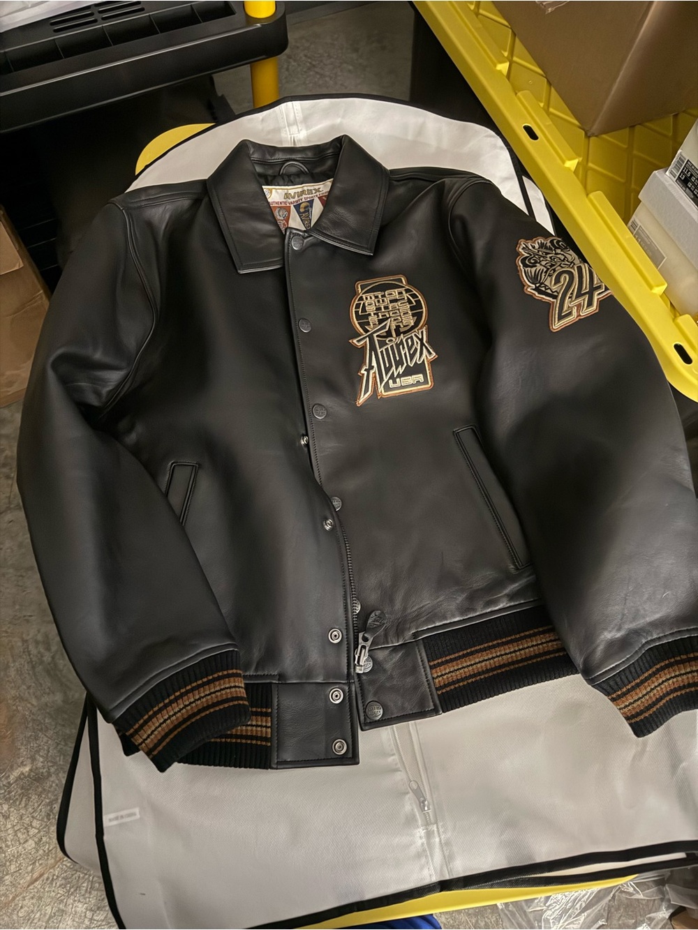 Avirex Black Leather Bomber Jacket with Tan Patch Accents